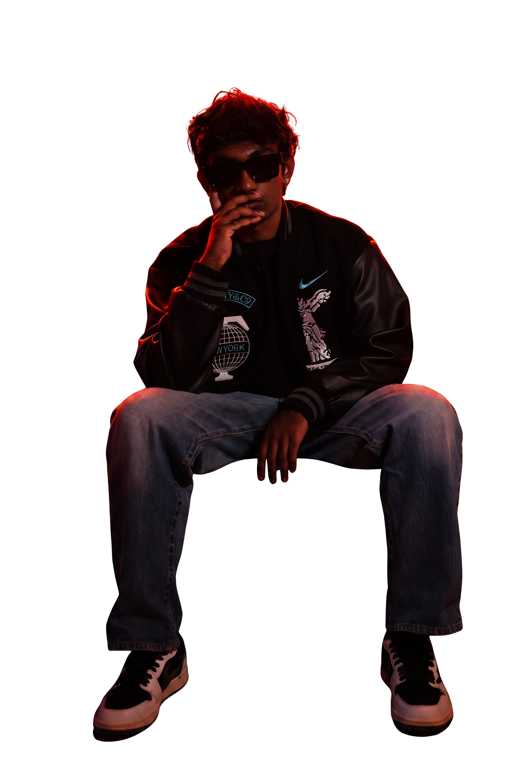 RYKARA, artist, producer and DJ, photographed under red light